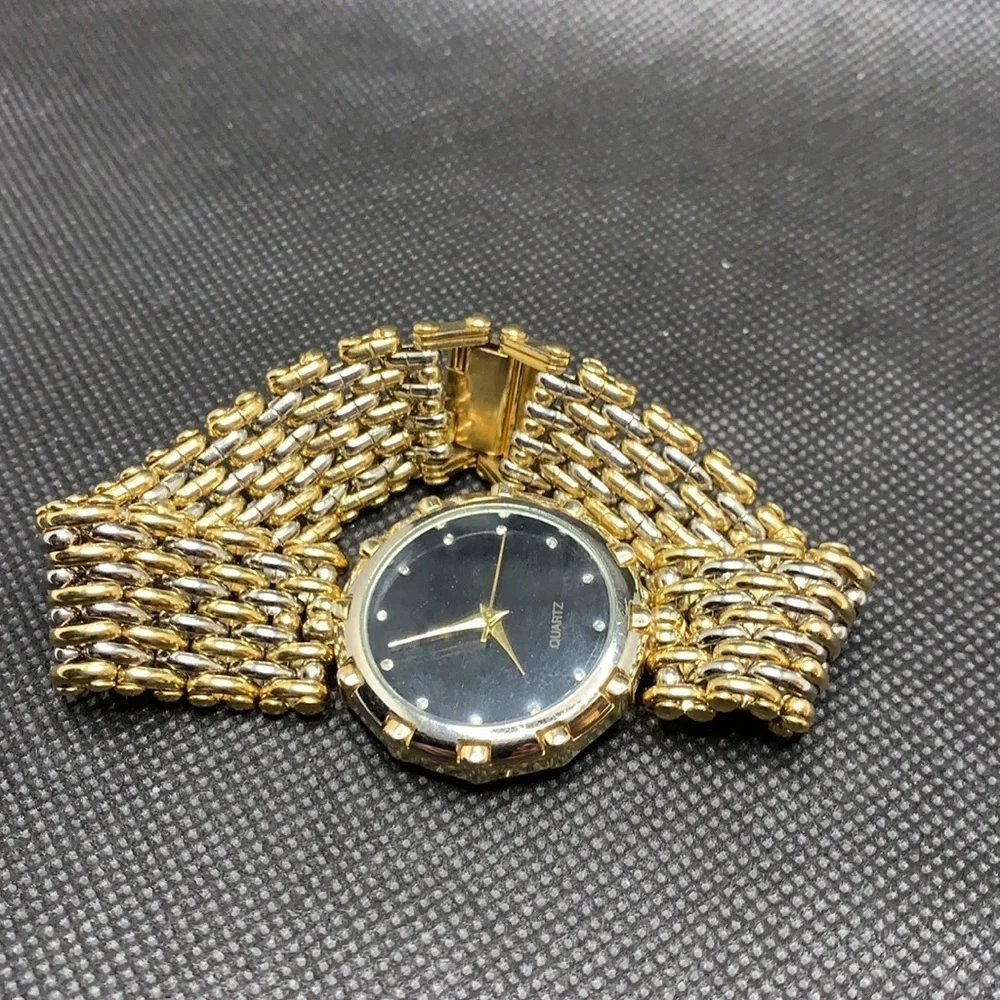 3/$27  Fashion watch with subtle two tone band